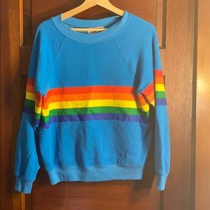 Rainbow stripe sweatshirt.